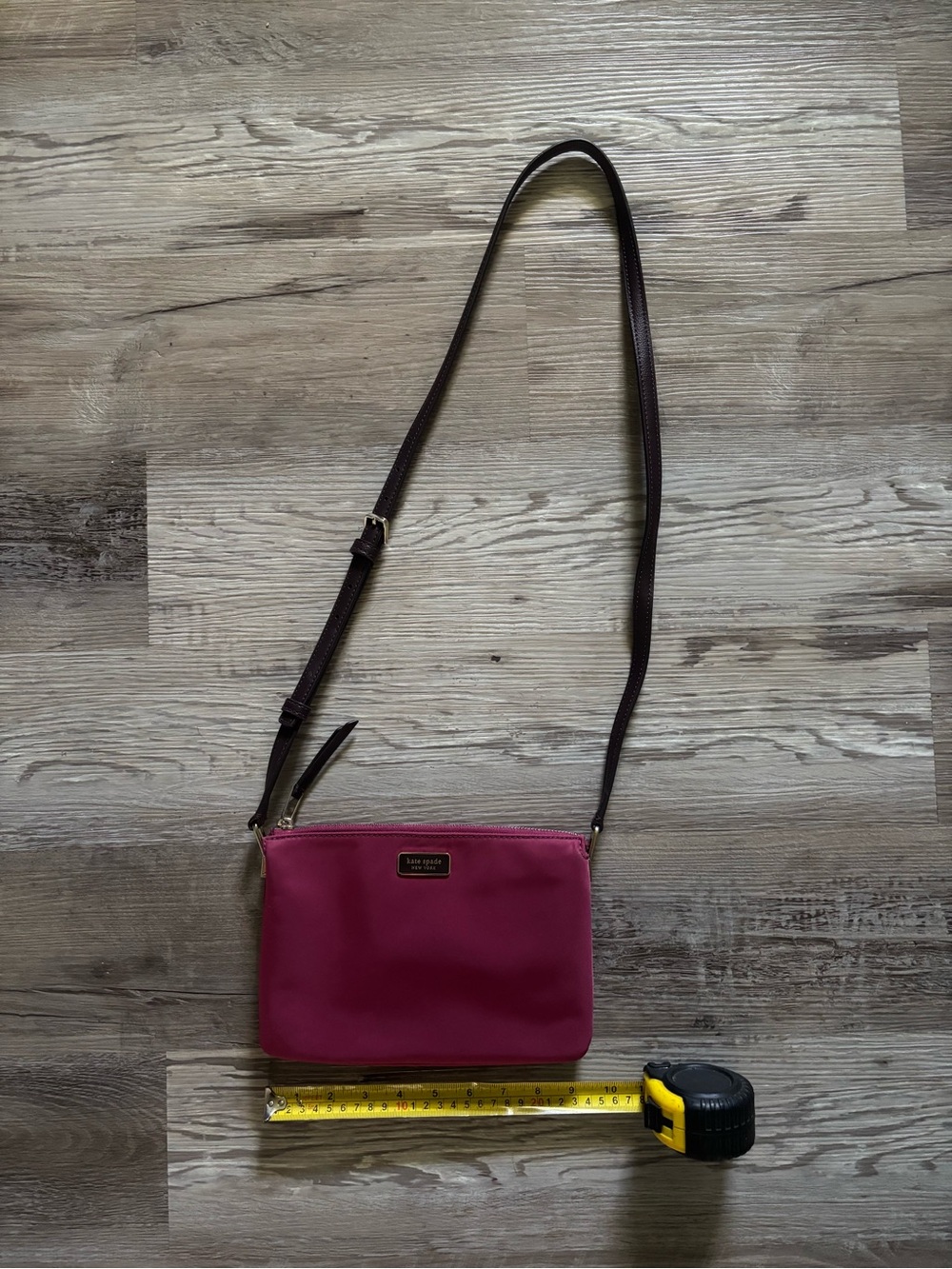 kate spade fuchsia crossbody with brown strap